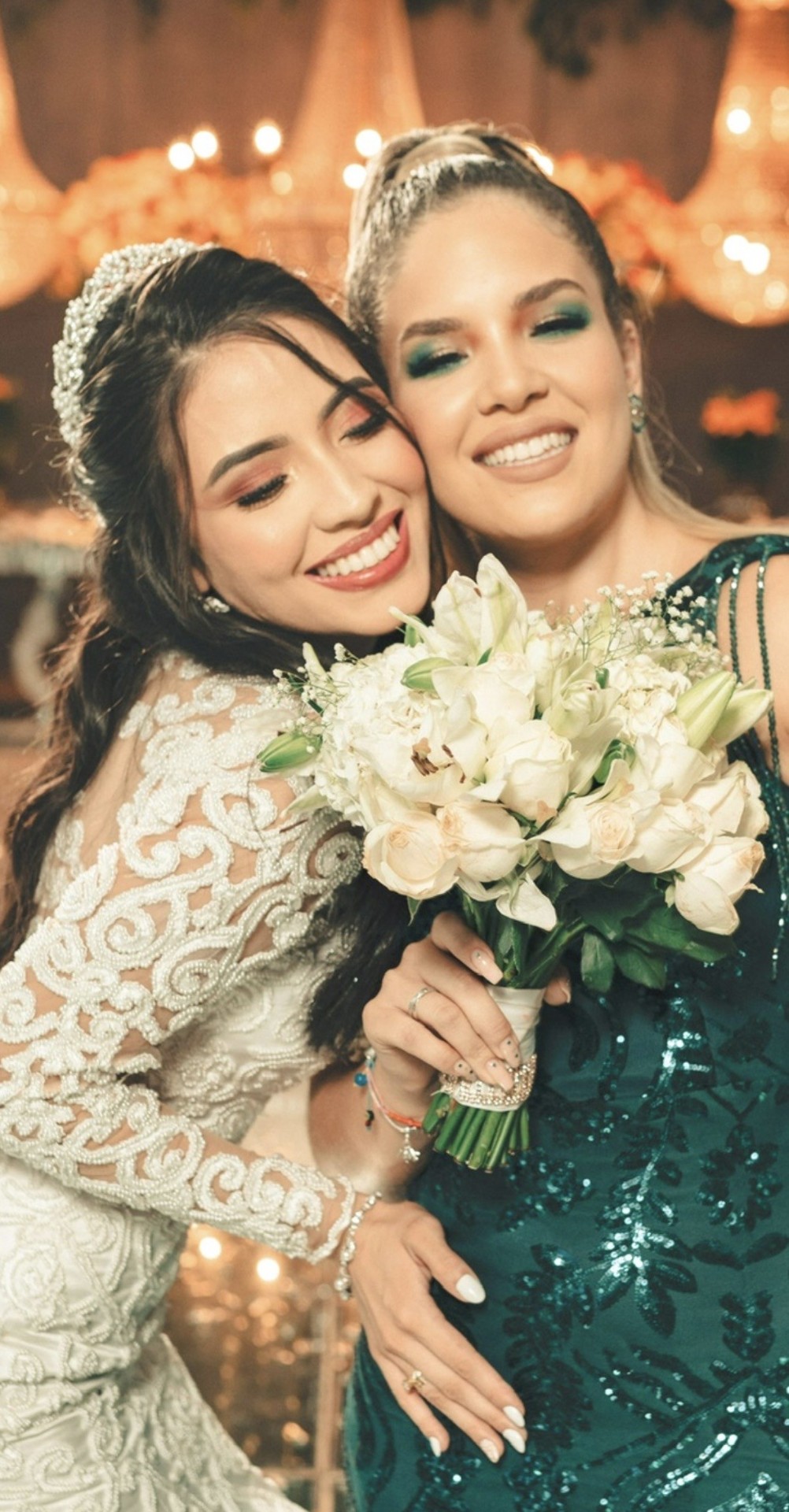 Bride and bridesmaid celebrating
